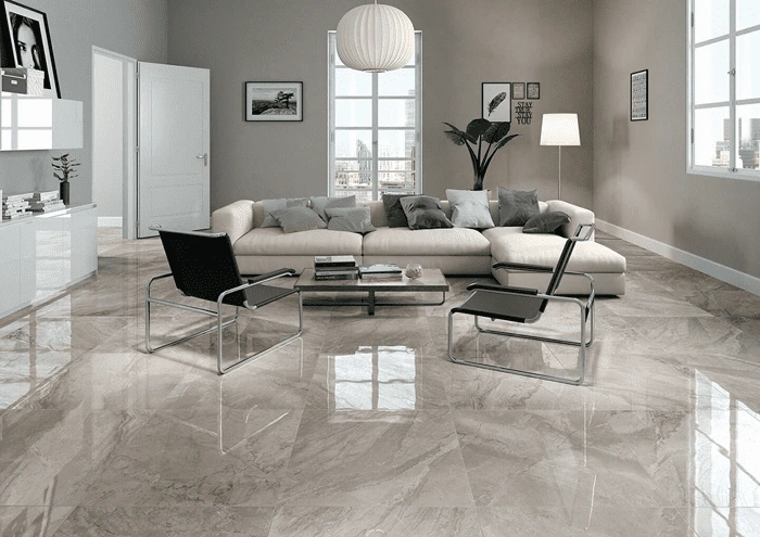 Large-format gray marble porcelain floor in a Bridgeview living room